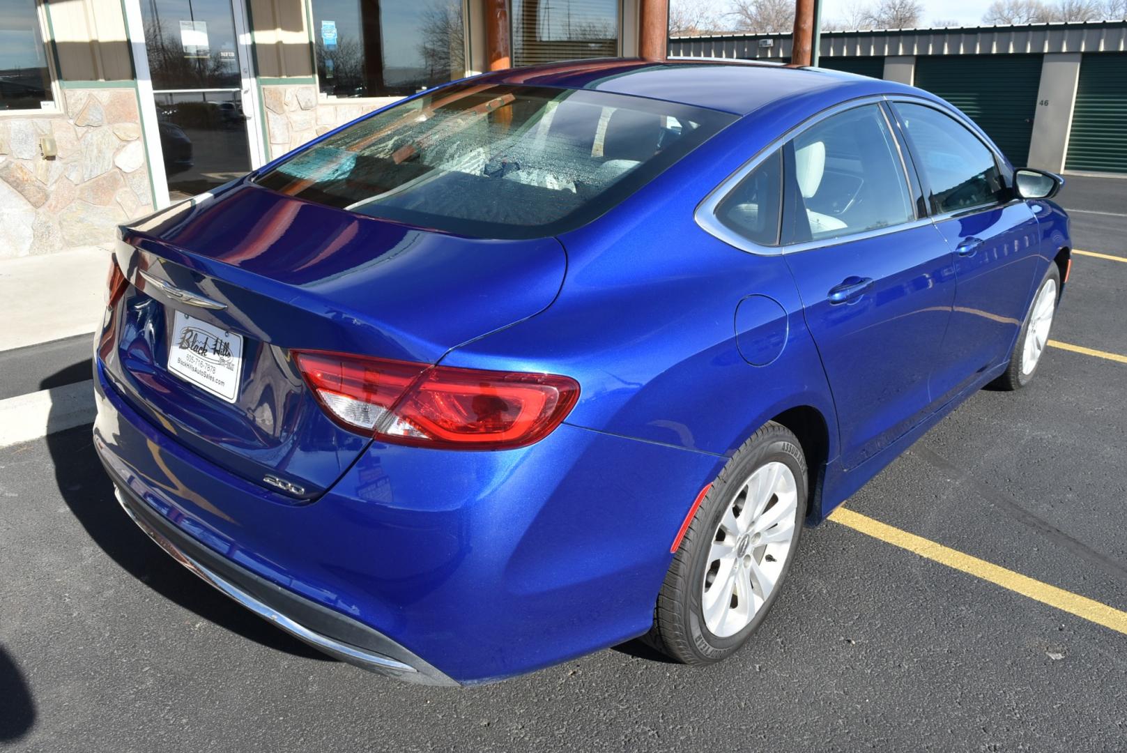 2016 Blue /White Chrysler 200 Limited (1C3CCCAB6GN) with an 2.4L 4 Cyl Multiair engine, 9-Speed Automatic transmission, located at 1600 E Hwy 44, Rapid City, SD, 57703, (605) 716-7878, 44.070232, -103.171410 - Photo#7